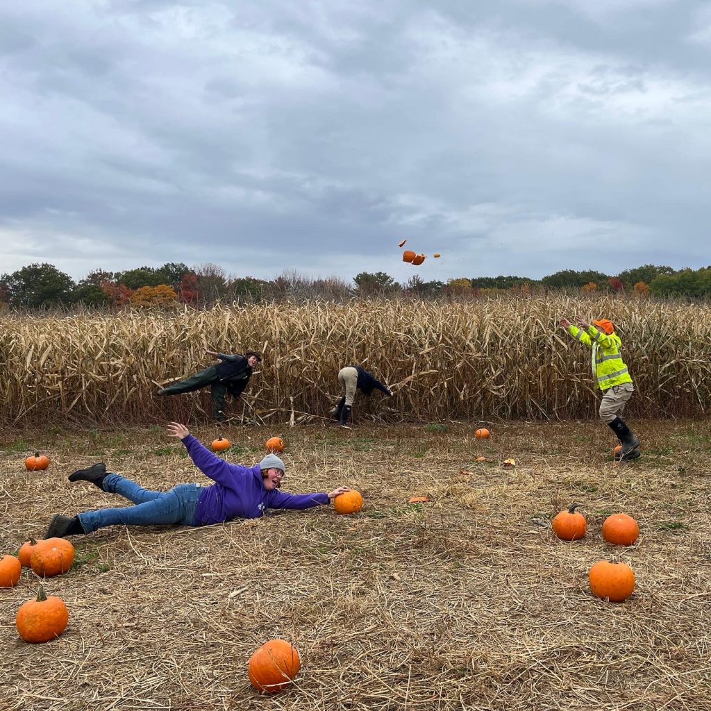 Pineland Farms staff having fun in the maze