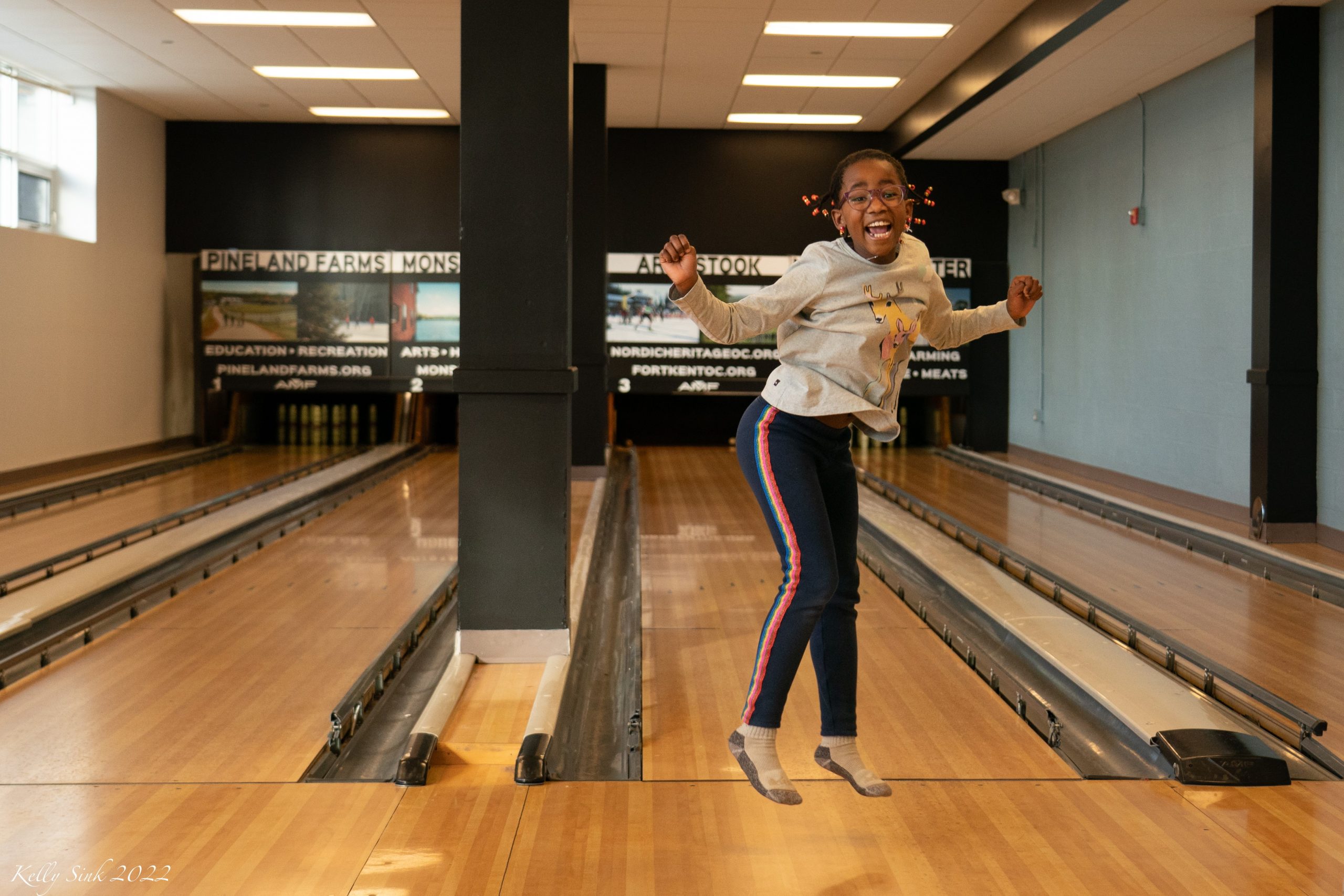 bowling shoes, bowling pins and ball for play in bowling