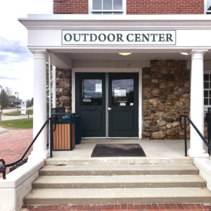 A photo of the front entrance to the Outdoor Center at Pineland Farms